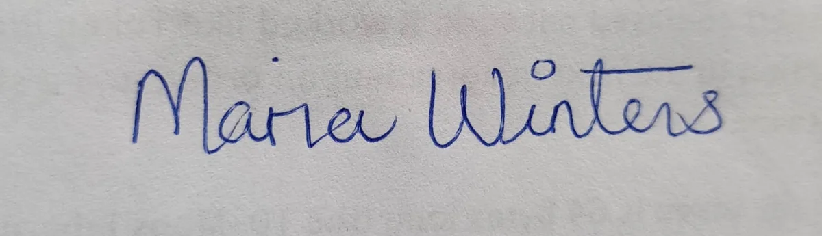 Example of a good signature photo: a signature in blue pen on plain paper, photographed straight on with space around it